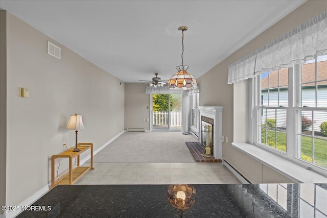 50 Normanton Ave, Manchester, NJ 08759 - unfurnished living room featuring carpet floors, healthy amount of natural light, and a baseboard heating unit