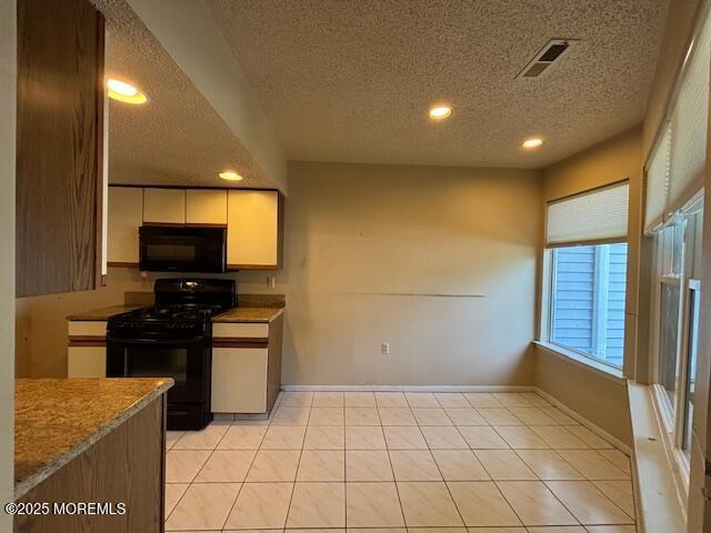 133 Sunnymede St, Englishtown, NJ 07726 - kitchen with black appliances, a textured ceiling, light countertops, white cabinetry, and recessed lighting