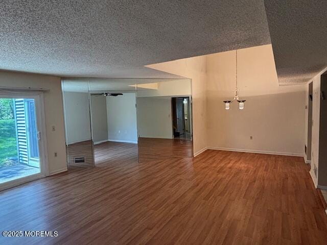 133 Sunnymede St, Englishtown, NJ 07726 - unfurnished room with a textured ceiling, wood finished floors, and ceiling fan
