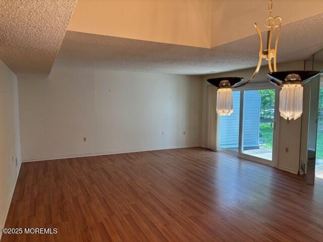 133 Sunnymede St, Englishtown, NJ 07726 - unfurnished room with a textured ceiling and wood finished floors