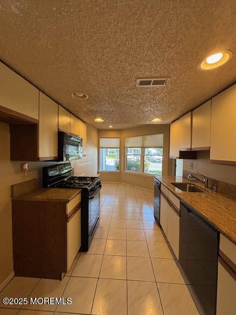 133 Sunnymede St, Englishtown, NJ 07726 - kitchen with black appliances, white cabinets, recessed lighting, a textured ceiling, and light tile patterned floors