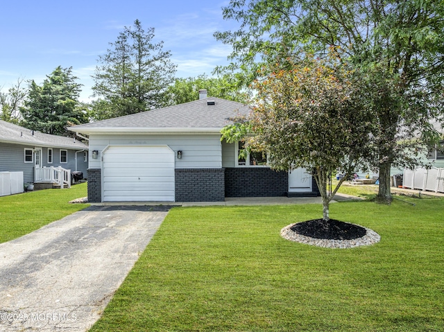 696 Jamaica Blvd, Toms River, NJ 08757 - view of front facade with brick siding, an attached garage, concrete driveway, a front yard, and roof with shingles