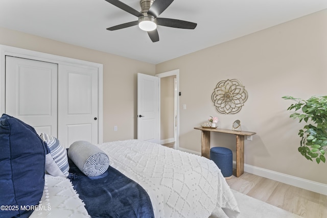 696 Jamaica Blvd, Toms River, NJ 08757 - bedroom with wood finished floors, a closet, and a ceiling fan