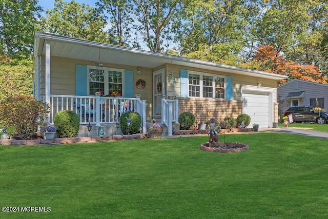 8 Wisconsin Ln, Whiting, NJ 08759 - view of front facade with a porch, asphalt driveway, a garage, and a front yard
