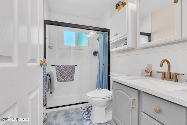 8 Wisconsin Ln, Whiting, NJ 08759 - bathroom featuring vanity, a tile shower, a decorative wall, and wainscoting