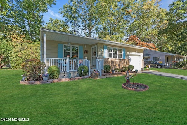 8 Wisconsin Ln, Whiting, NJ 08759 - view of front facade featuring a garage, covered porch, driveway, and a front lawn