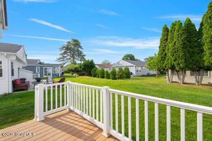 169 Pulaski Blvd, Toms River, NJ 08757 - deck with a lawn and a residential view