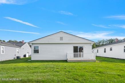 169 Pulaski Blvd, Toms River, NJ 08757 - back of house featuring a yard