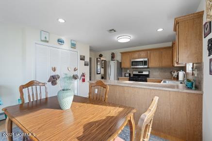 169 Pulaski Blvd, Toms River, NJ 08757 - dining area featuring recessed lighting
