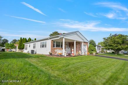 169 Pulaski Blvd, Toms River, NJ 08757 - view of front of property with a front yard