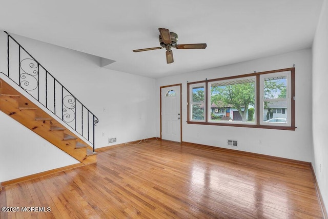 1316 Sunset Ave, Point Pleasant, NJ 08742 - unfurnished living room with stairs, wood finished floors, and a ceiling fan