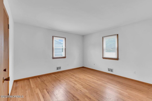 1316 Sunset Ave, Point Pleasant, NJ 08742 - empty room featuring light wood-style flooring