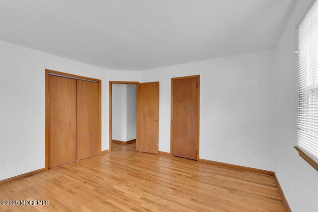 1316 Sunset Ave, Point Pleasant, NJ 08742 - unfurnished bedroom with light wood-type flooring and baseboards