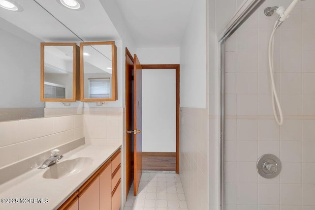 1316 Sunset Ave, Point Pleasant, NJ 08742 - full bathroom featuring a tile shower, tile walls, vanity, wainscoting, and recessed lighting