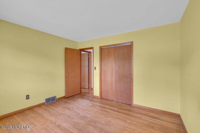 1316 Sunset Ave, Point Pleasant, NJ 08742 - unfurnished bedroom with light wood finished floors and a closet