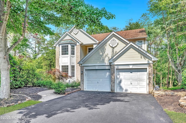 8 Armistead Ky, Colts Neck, NJ 07722 - traditional-style house featuring driveway and a garage