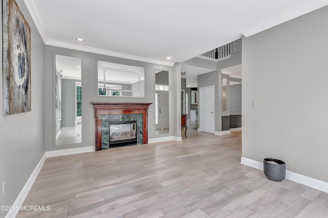 8 Armistead Ky, Colts Neck, NJ 07722 - unfurnished living room featuring ornamental molding, a fireplace, wood finished floors, and recessed lighting