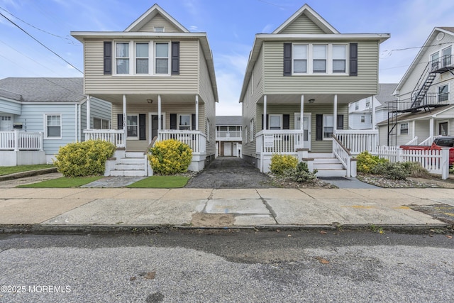 1103 A St, Belmar, NJ 07719 - view of property featuring covered porch and stairs