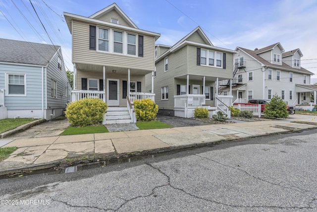 1103 A St, Belmar, NJ 07719 - view of front facade featuring covered porch and a residential view