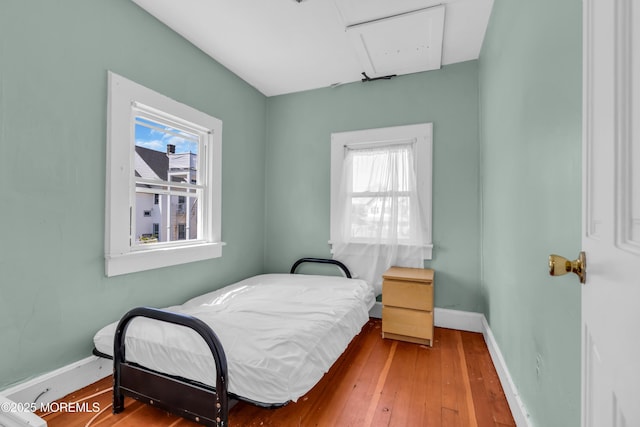 1103 A St, Belmar, NJ 07719 - bedroom featuring multiple windows, wood-type flooring, and attic access