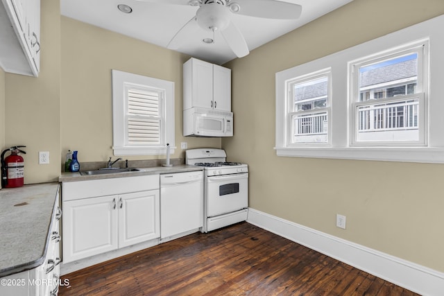 1103 A St, Belmar, NJ 07719 - kitchen with white appliances, ceiling fan, white cabinetry, dark wood-type flooring, and light countertops