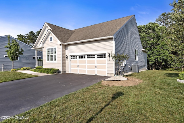 11 Starboard Ct, Little Egg Harbor, NJ 08087 - view of front of house with a garage, asphalt driveway, a front yard, and roof with shingles