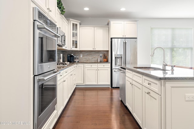 11 Starboard Ct, Little Egg Harbor, NJ 08087 - kitchen featuring appliances with stainless steel finishes, recessed lighting, tasteful backsplash, light stone counters, and white cabinets