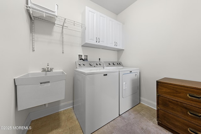 11 Starboard Ct, Little Egg Harbor, NJ 08087 - laundry area featuring independent washer and dryer, cabinet space, and light tile patterned floors