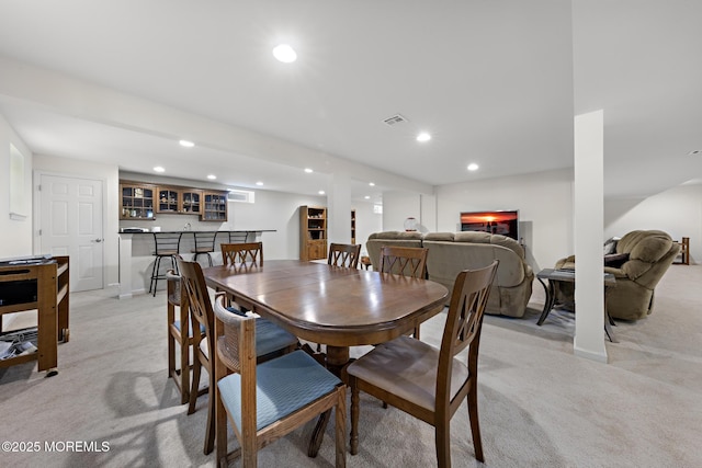 11 Starboard Ct, Little Egg Harbor, NJ 08087 - dining area featuring light carpet, recessed lighting, and bar
