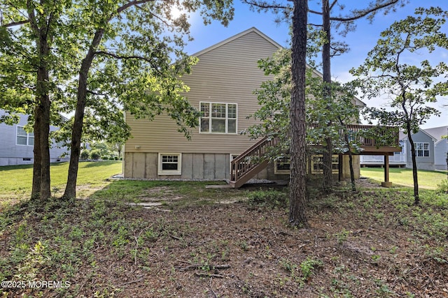 11 Starboard Ct, Little Egg Harbor, NJ 08087 - rear view of house featuring stairs, a deck, and a lawn