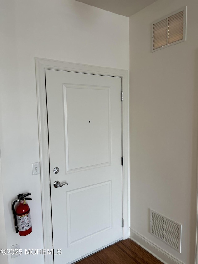 2346 Rte 33 Unit 205, Robbinsville, NJ 08691 - doorway to outside featuring dark wood-type flooring and baseboards