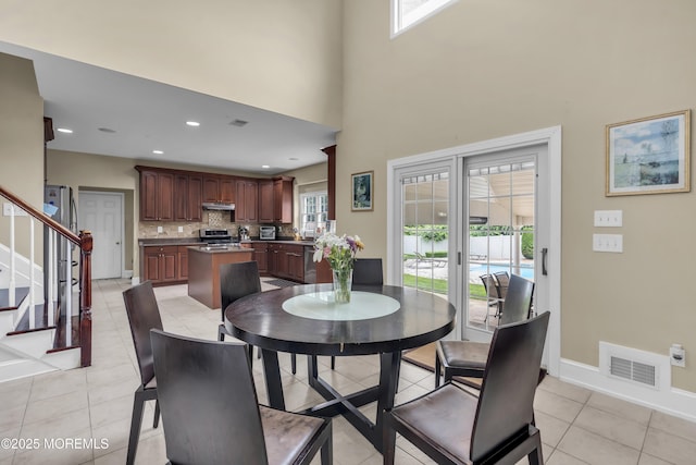 2 Michaels Ct, Jackson, NJ 08527 - dining room featuring stairs, light tile patterned floors, recessed lighting, and a high ceiling