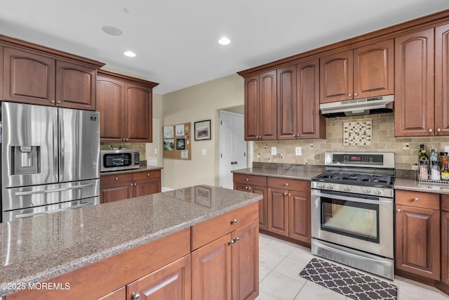 2 Michaels Ct, Jackson, NJ 08527 - kitchen with appliances with stainless steel finishes, under cabinet range hood, decorative backsplash, stone counters, and recessed lighting