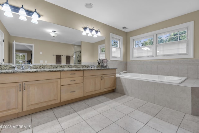 2 Michaels Ct, Jackson, NJ 08527 - full bath featuring double vanity, tile patterned flooring, a bath, and a shower with door