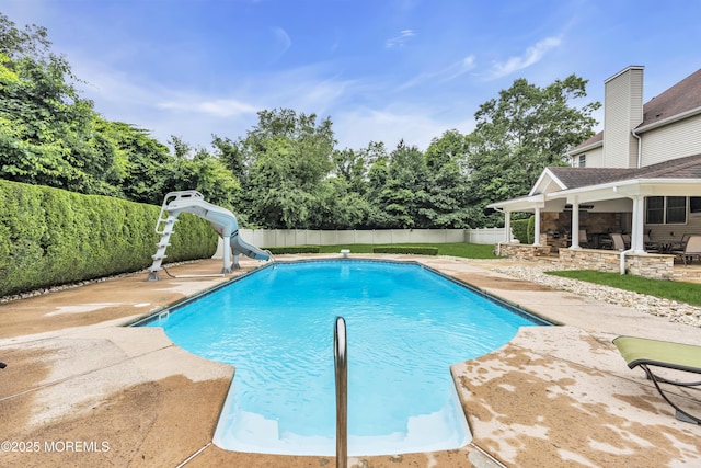 2 Michaels Ct, Jackson, NJ 08527 - view of pool featuring a water slide, a patio area, a fenced backyard, and view of scattered trees