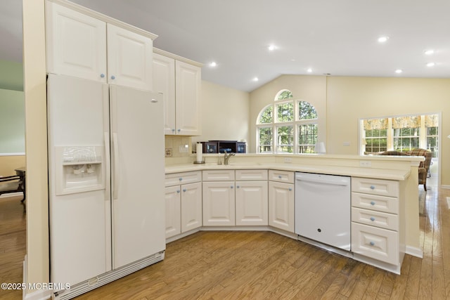 105 Golf View Dr, Little Egg Harbor, NJ 08087 - kitchen featuring white appliances, light wood-style flooring, white cabinets, vaulted ceiling, and recessed lighting