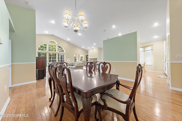105 Golf View Dr, Little Egg Harbor, NJ 08087 - dining room featuring light wood-style flooring, a chandelier, and lofted ceiling