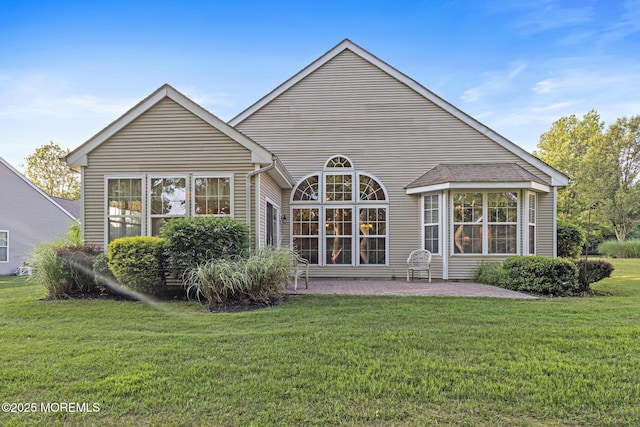 105 Golf View Dr, Little Egg Harbor, NJ 08087 - back of house featuring a patio area and a lawn