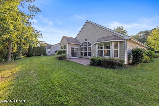 105 Golf View Dr, Little Egg Harbor, NJ 08087 - rear view of house featuring a lawn and a patio area