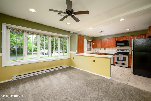 1161B Argyll Cir, Lakewood, NJ 08701 - kitchen featuring stainless steel appliances, a baseboard heating unit, a peninsula, light colored carpet, and ceiling fan