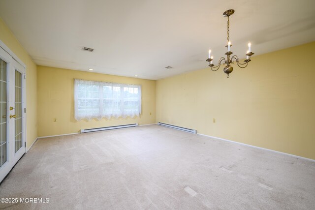 1161B Argyll Cir, Lakewood, NJ 08701 - empty room featuring a baseboard radiator, a chandelier, and light colored carpet