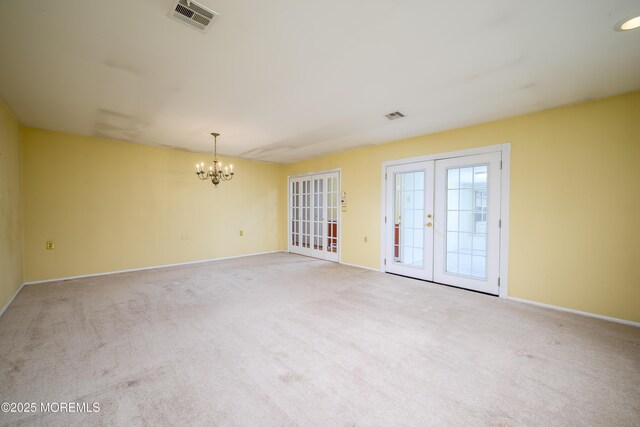 1161B Argyll Cir, Lakewood, NJ 08701 - carpeted spare room featuring french doors and a chandelier