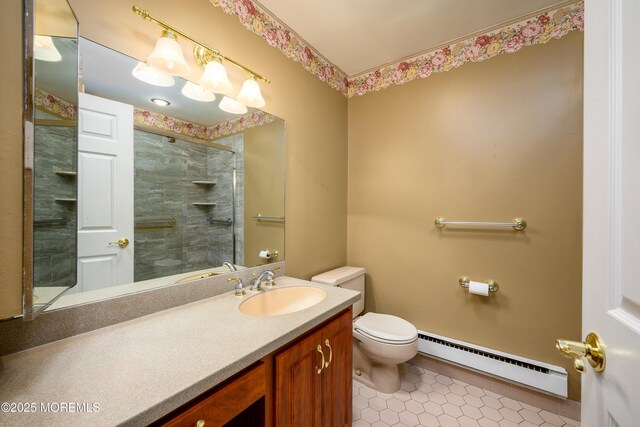 1161B Argyll Cir, Lakewood, NJ 08701 - bathroom featuring baseboard heating, vanity, tiled shower, and tile patterned flooring