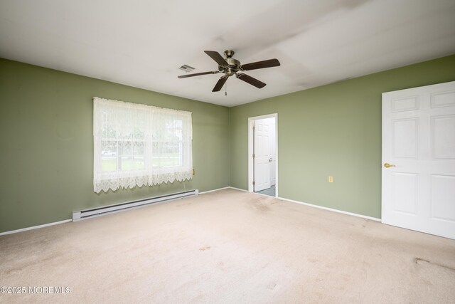 1161B Argyll Cir, Lakewood, NJ 08701 - spare room featuring baseboard heating, carpet floors, and a ceiling fan