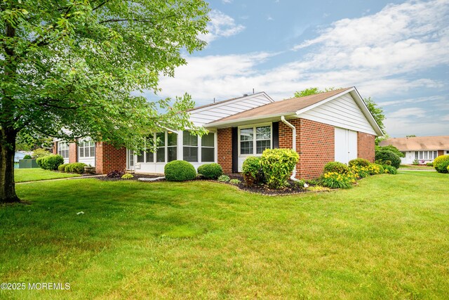 1161B Argyll Cir, Lakewood, NJ 08701 - single story home featuring brick siding and a front yard