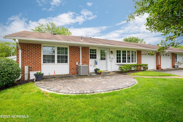1161B Argyll Cir, Lakewood, NJ 08701 - ranch-style home featuring an attached garage, asphalt driveway, a front yard, and brick siding