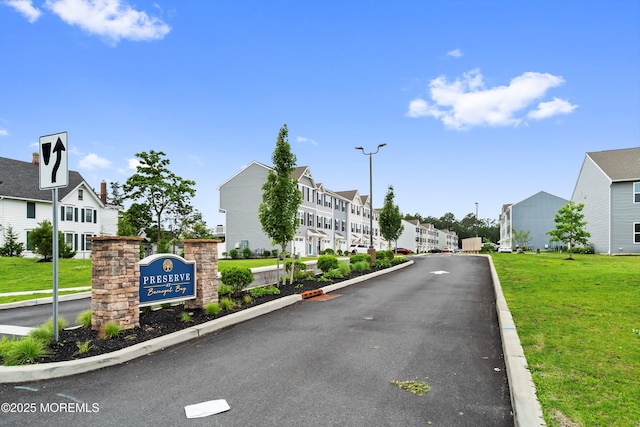 404 Cyprus Ct, Forked River, NJ 08731 - view of asphalt road with a residential view, curbs, and street lighting