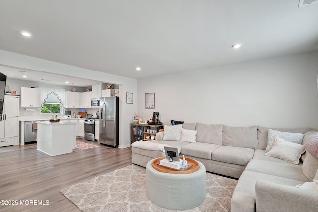 404 Cyprus Ct, Forked River, NJ 08731 - living area featuring light wood finished floors and recessed lighting