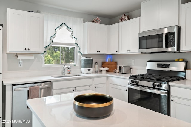 404 Cyprus Ct, Forked River, NJ 08731 - kitchen with appliances with stainless steel finishes, light countertops, and white cabinets