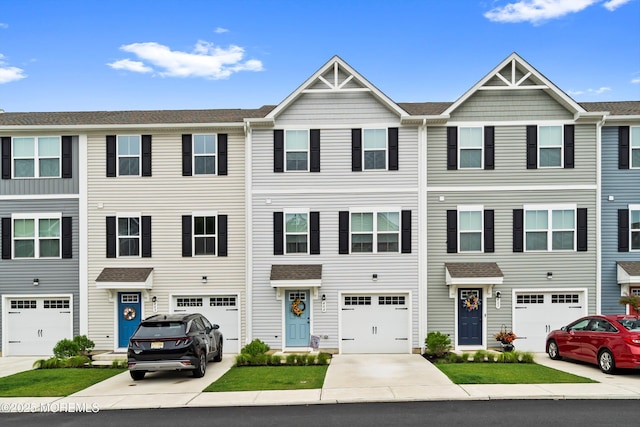 404 Cyprus Ct, Forked River, NJ 08731 - townhome / multi-family property featuring driveway and an attached garage